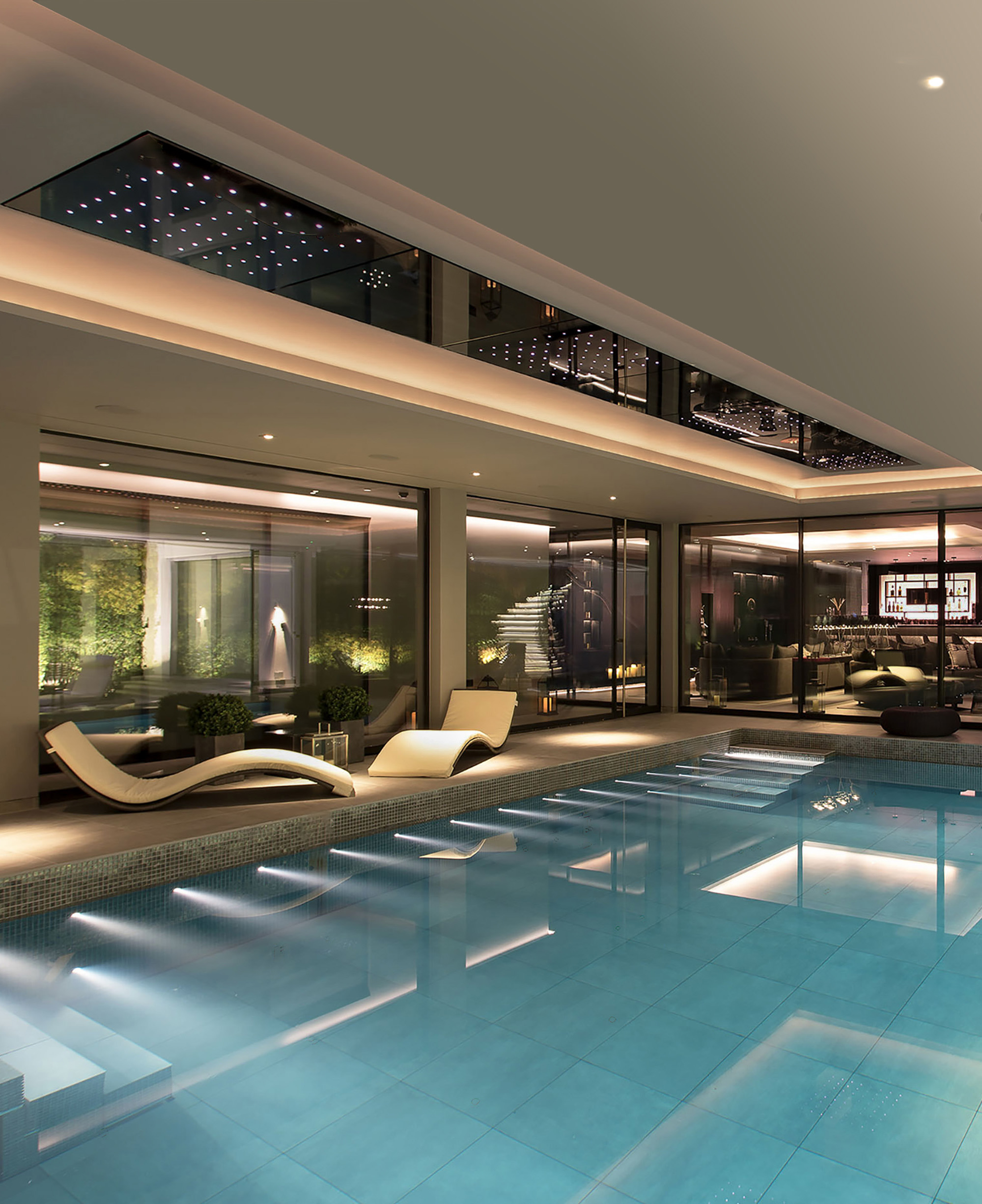 Indoor personal pool for luxury contemporary home: Links Way project designed by Luxury London Interiors firm: Moderno Interiors.